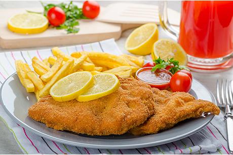 Surschnitzel paniert