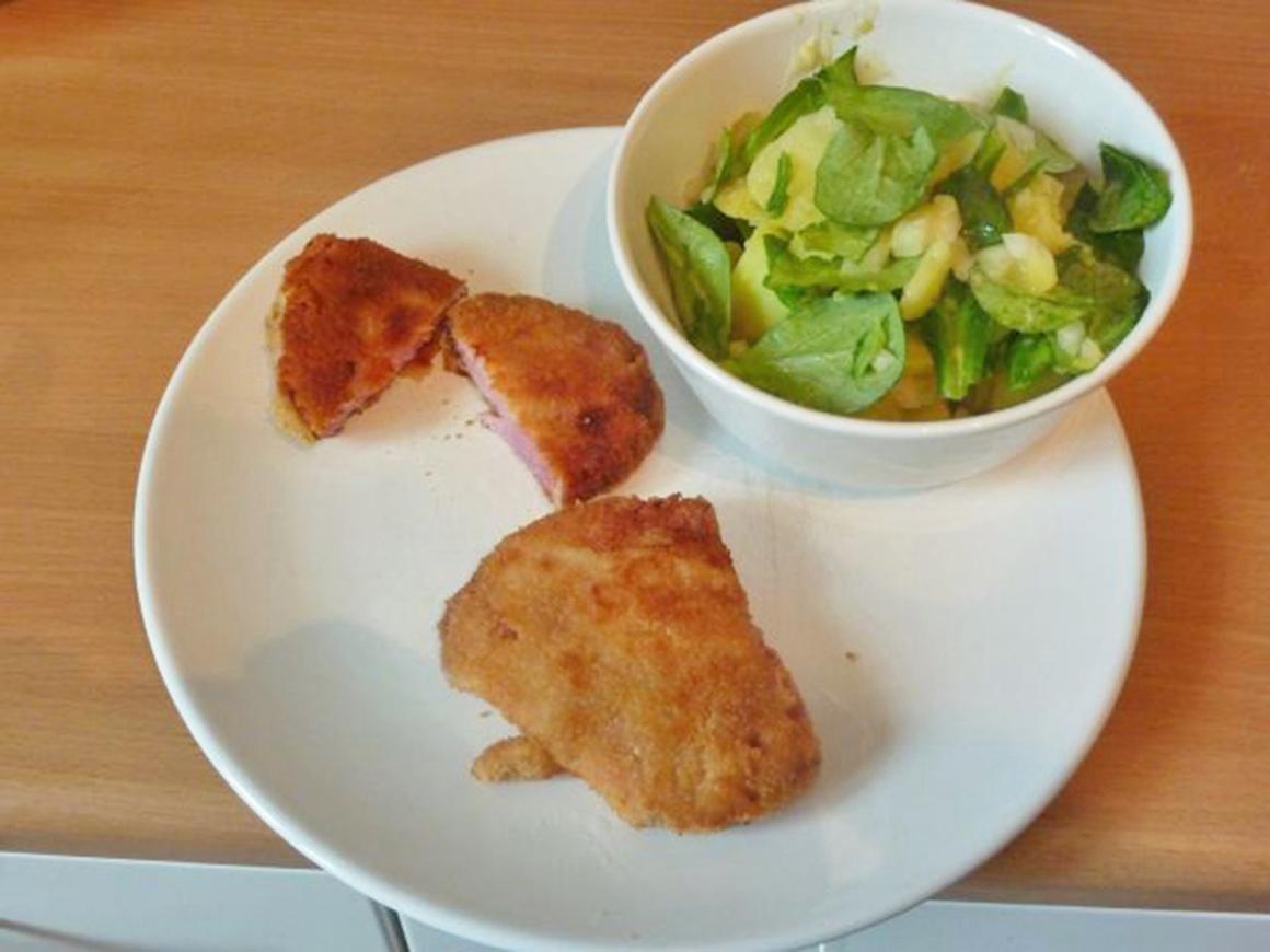 Surschnitzel paniert