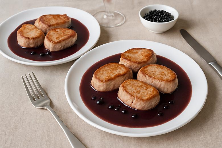 Schweinsmedaillons mit Holunder-Rotweinsauce